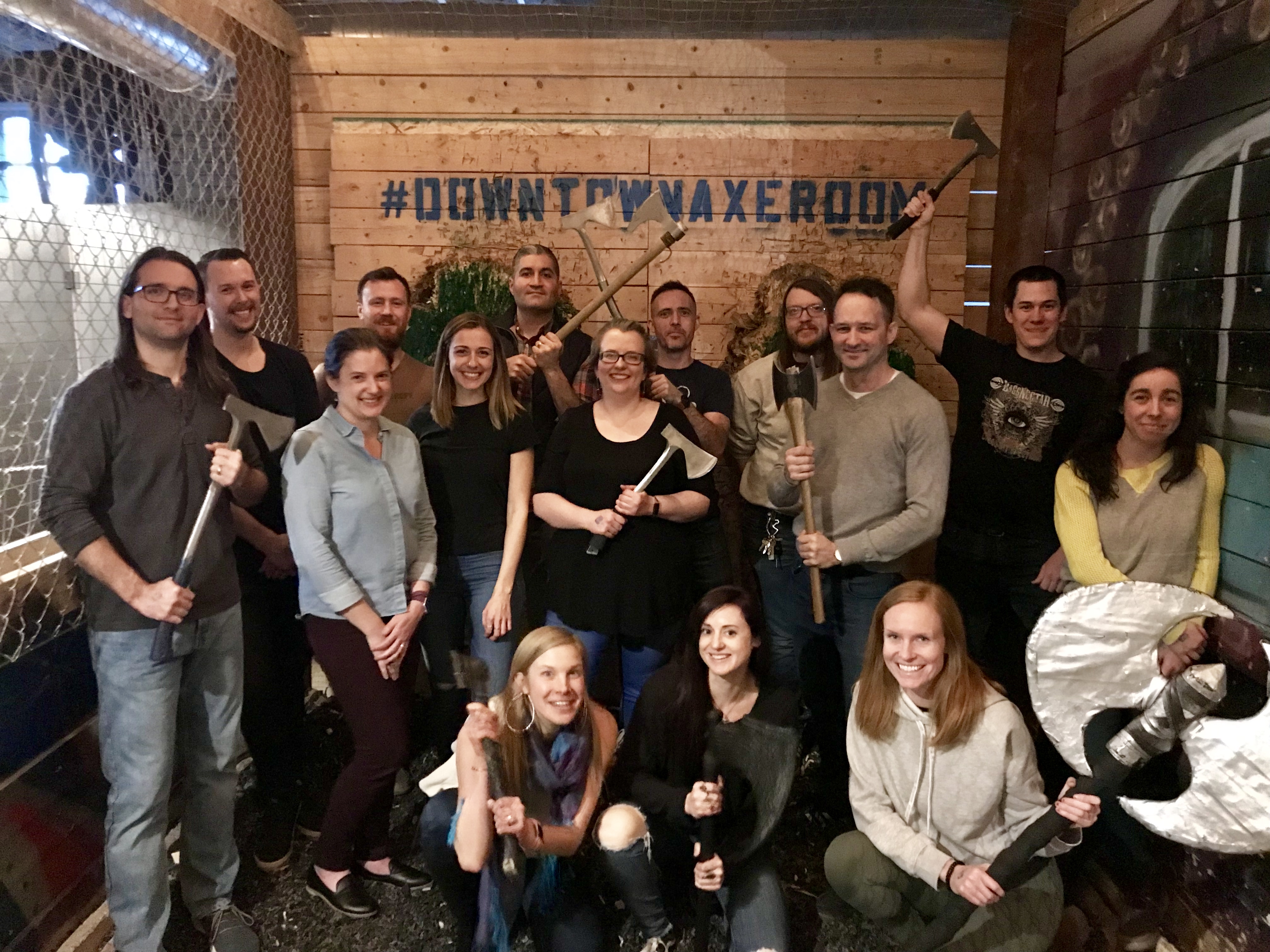 axe throwing with coworkers