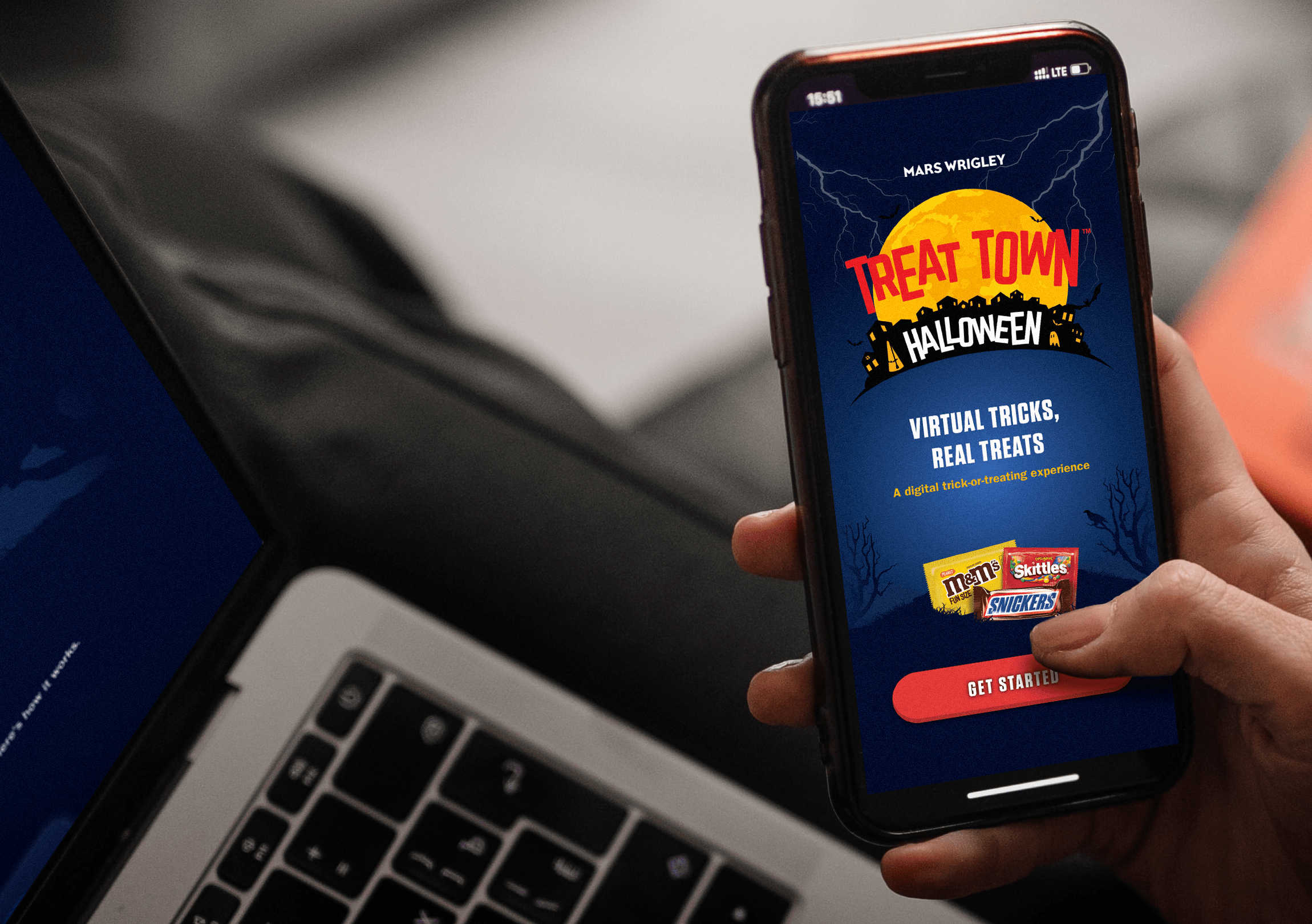 Mars Treat Town mobile app on phone and website on laptop