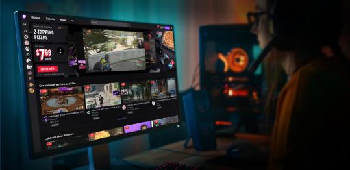 Picture of a gaming setup with a Domino's Canada ad displayed