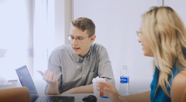 trainer and attendee talking